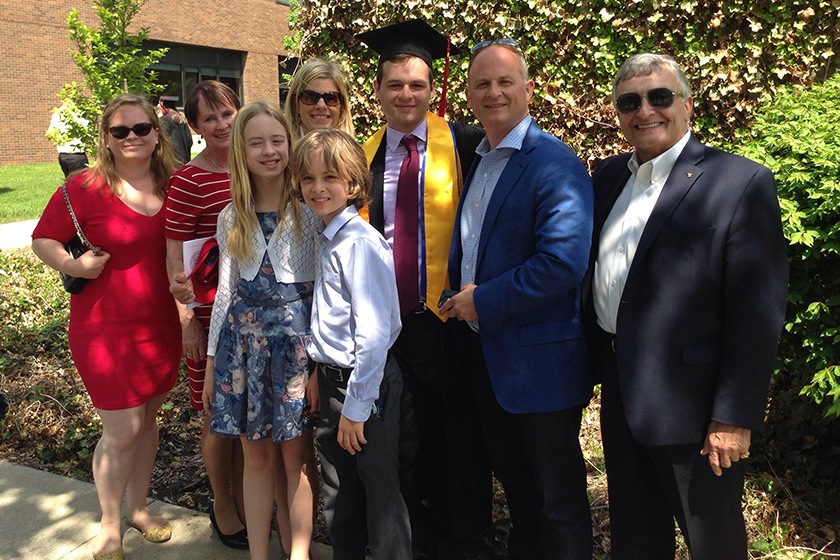 Members of the Gancas family celebrate a 2014 graduation