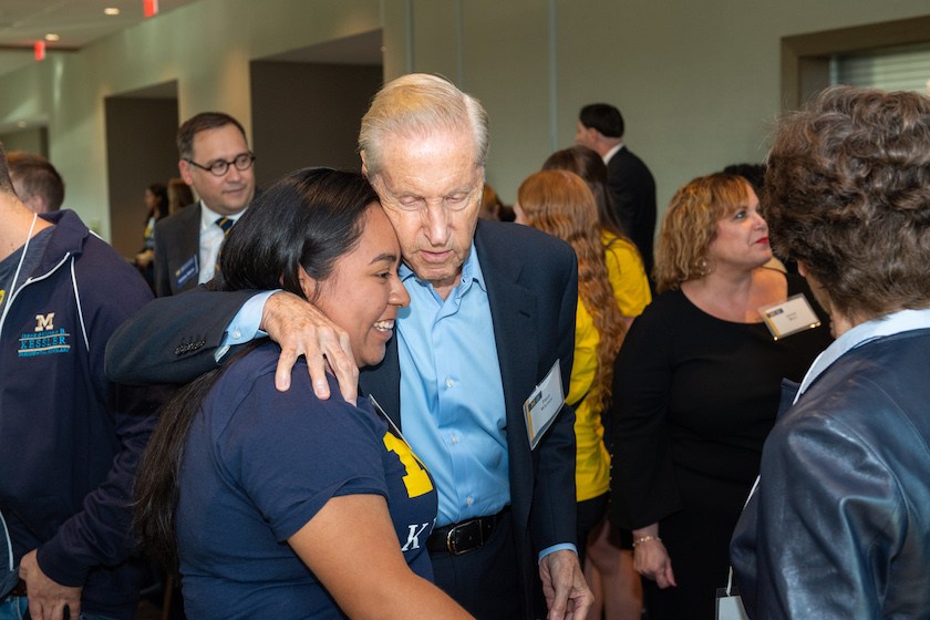 Erica Gonzalez-Paramo, a Kessler Scholar at the University of Michigan, greets Fred Wilpon at the Kessler Annual Dinner in September 2018.
