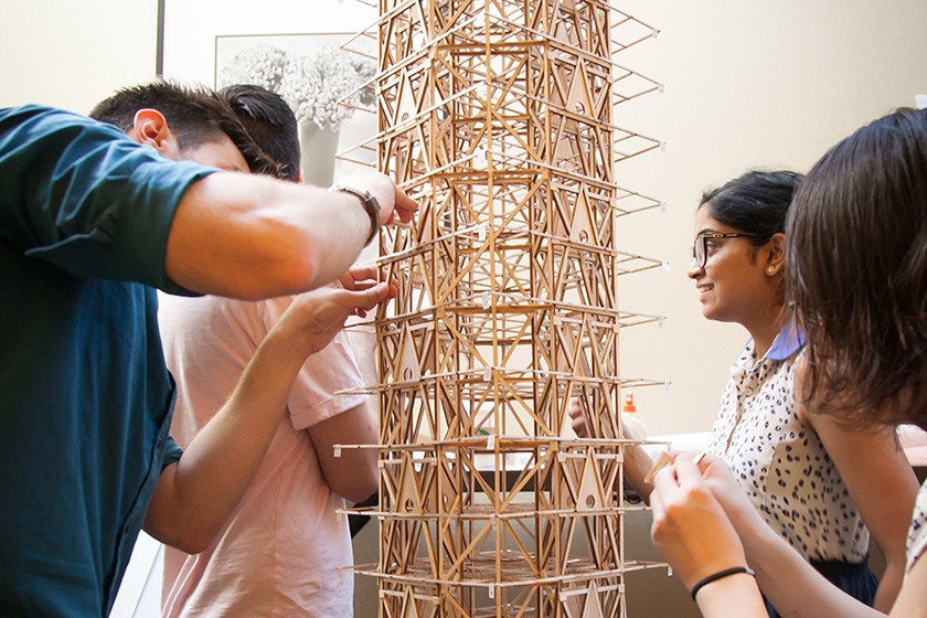 The Cornell Seismic Design Team repairing its wooden tower